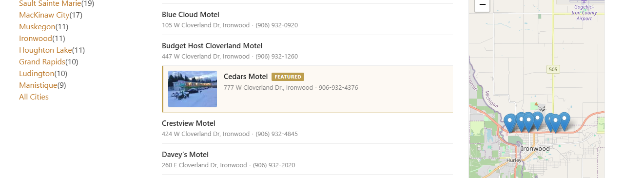 A city listing page where one motel has a photo thumbnail, making it stand out from the other listings around it